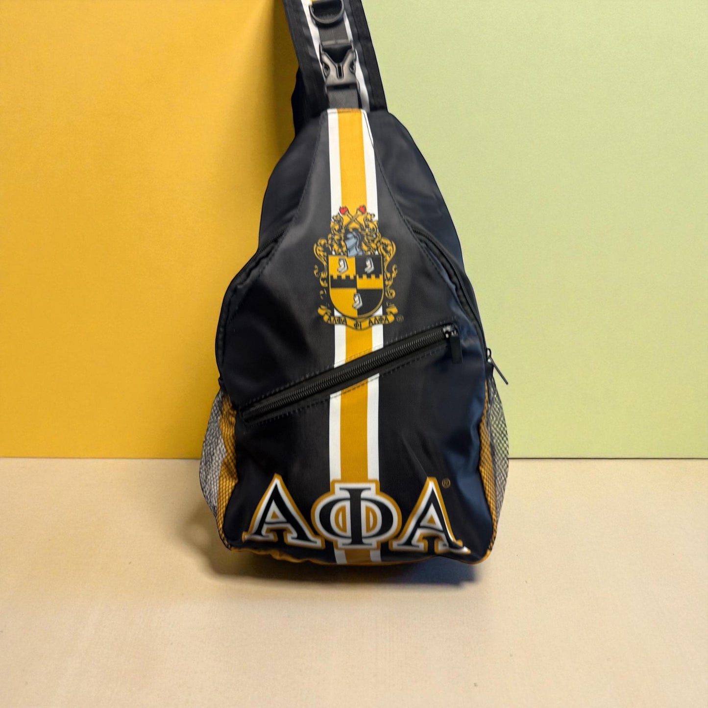 Alpha Phi Alpha Sling Backpack, Black and Gold Crest, Crossbody Bag